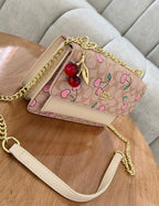 Nolita coach con cereza